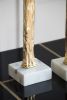 5.5x5.5x32" Elongated Gold Roman Statue on White Marble Base
