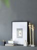 5.5x5.5x32" Elongated Gold Roman Statue on White Marble Base